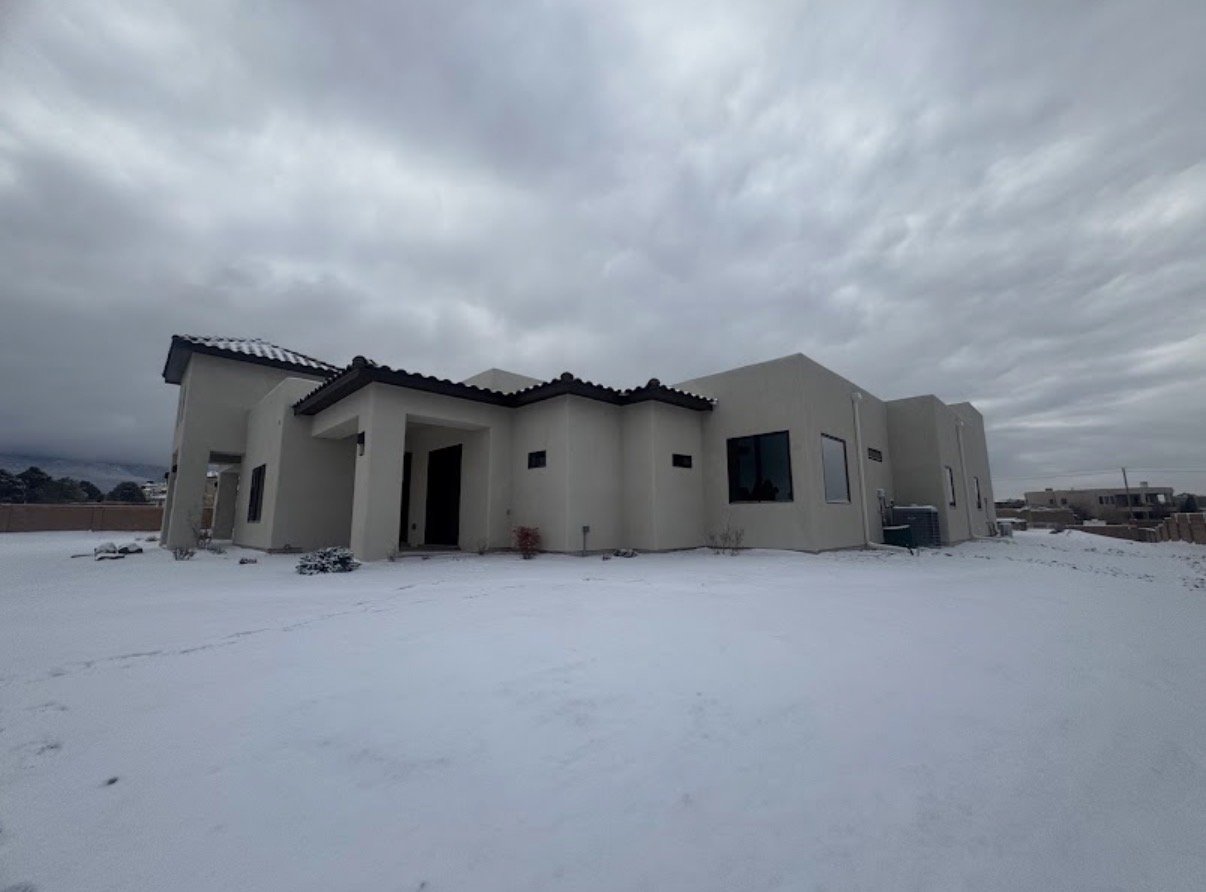 Custom estate after a winter snowfall