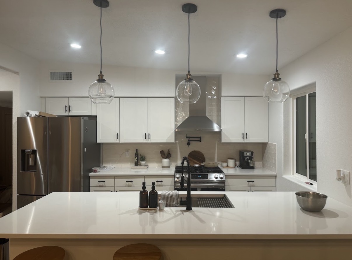 White shaker kitchen with quartz island